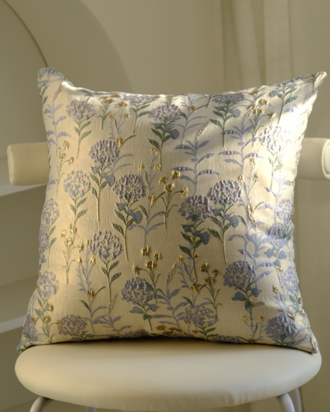 Close-up of woven hydrangea floral pattern on cushion