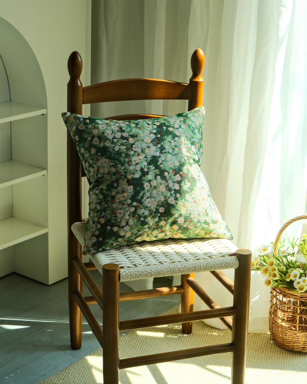 Cottage floral pillow cover on wooden chair