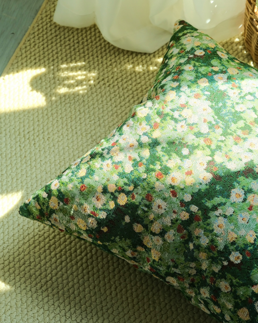 Close-up of forest green botanical cushion cover fabric