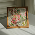Pink daisy framed fabric art with walnut finish