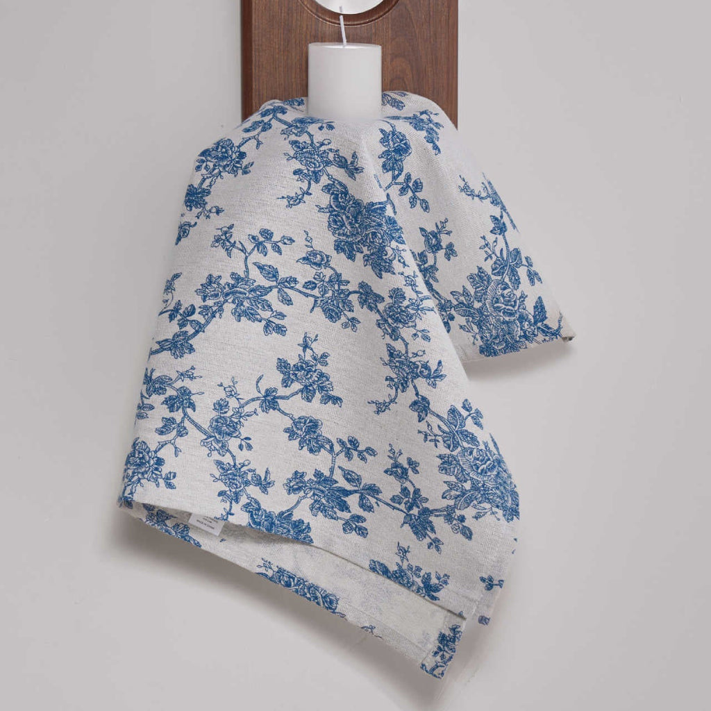 Soft blue floral napkin draping, light cotton blend