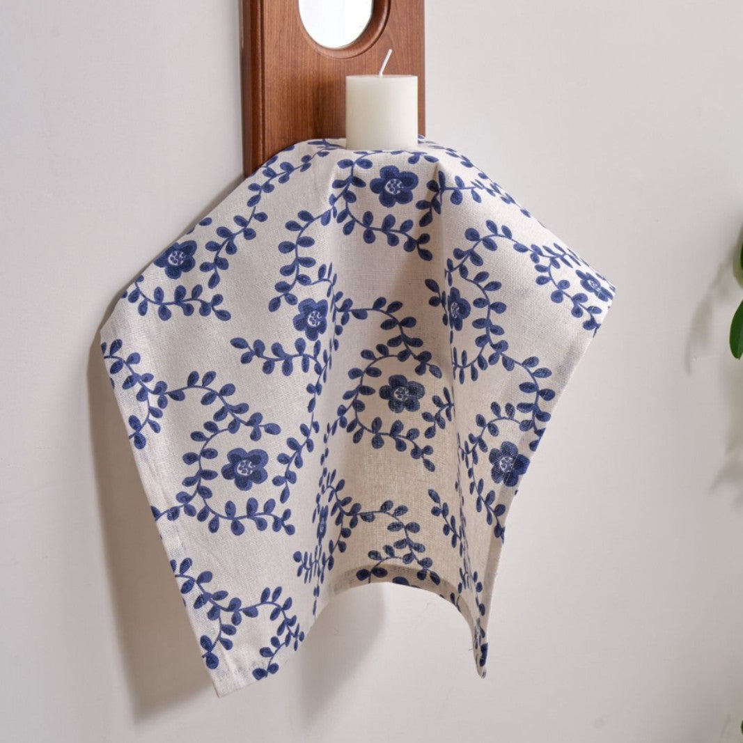 Soft blue floral napkin draping, light cotton blend