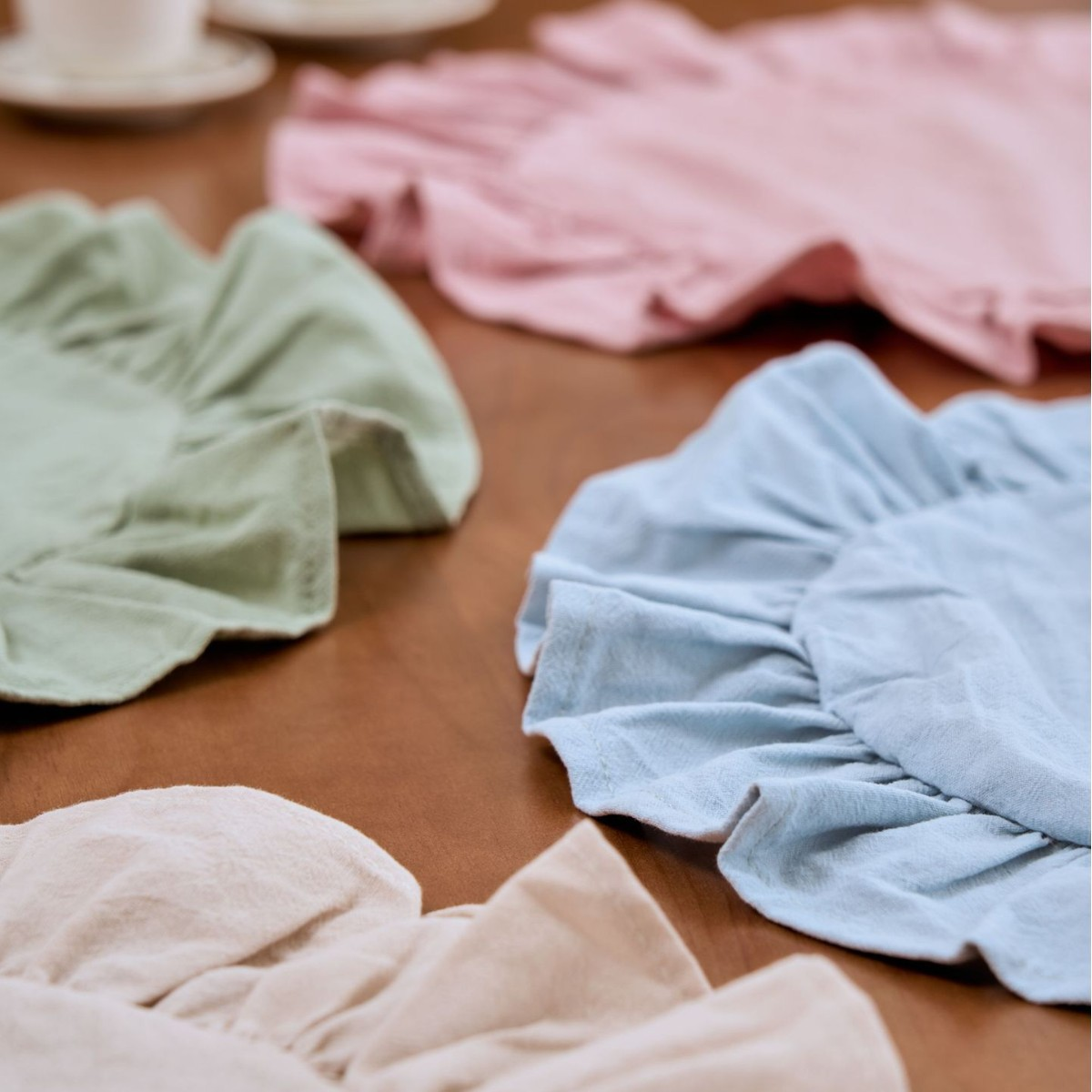 Ruffle round placemats set of 4 in sage, pink, blue, beige