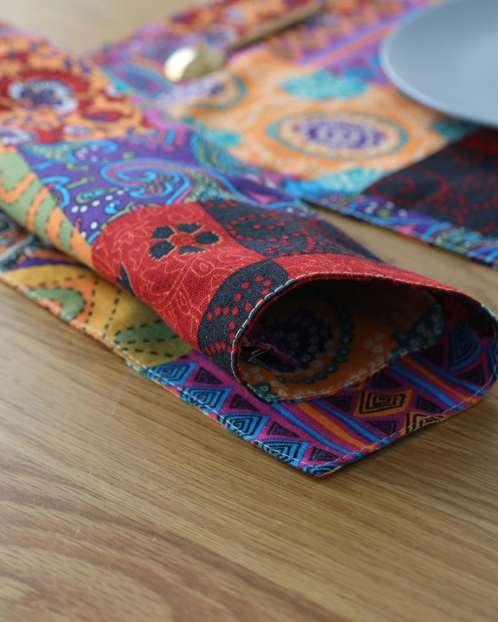 Close-up of colorful paisley mandala patchwork pattern