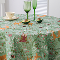 Woodland Fox and Deer tablecloth on a round table with teacup and glasses