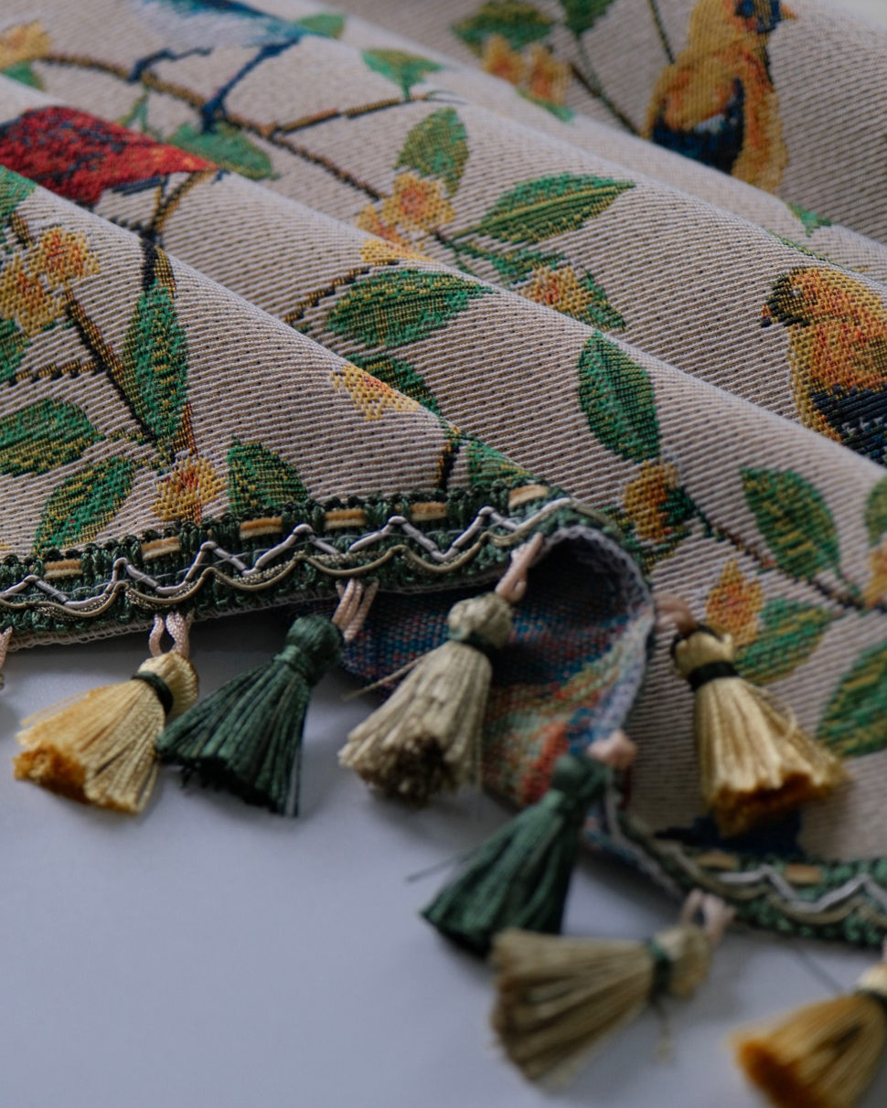 Close view of tassel trim edge on Bluebird Garden tablecloth