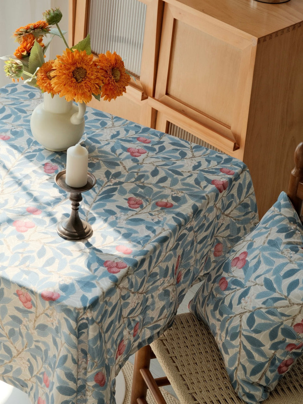 Blue botanical tablecloth dining room setting
