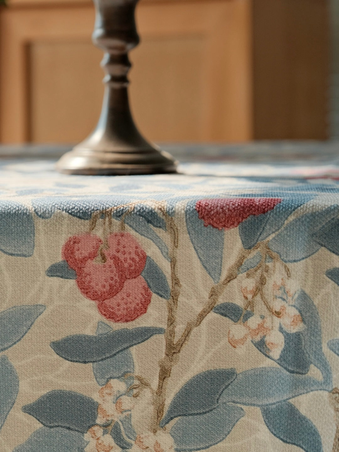 Floral leaf print tablecloth fabric detail
