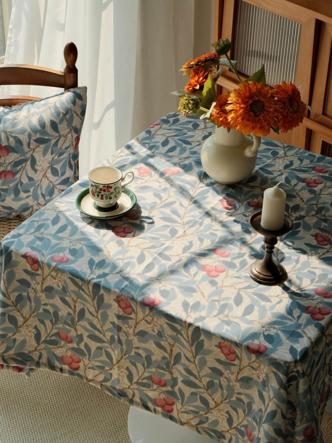 Vintage botanical tablecloth with blue leaves and berries