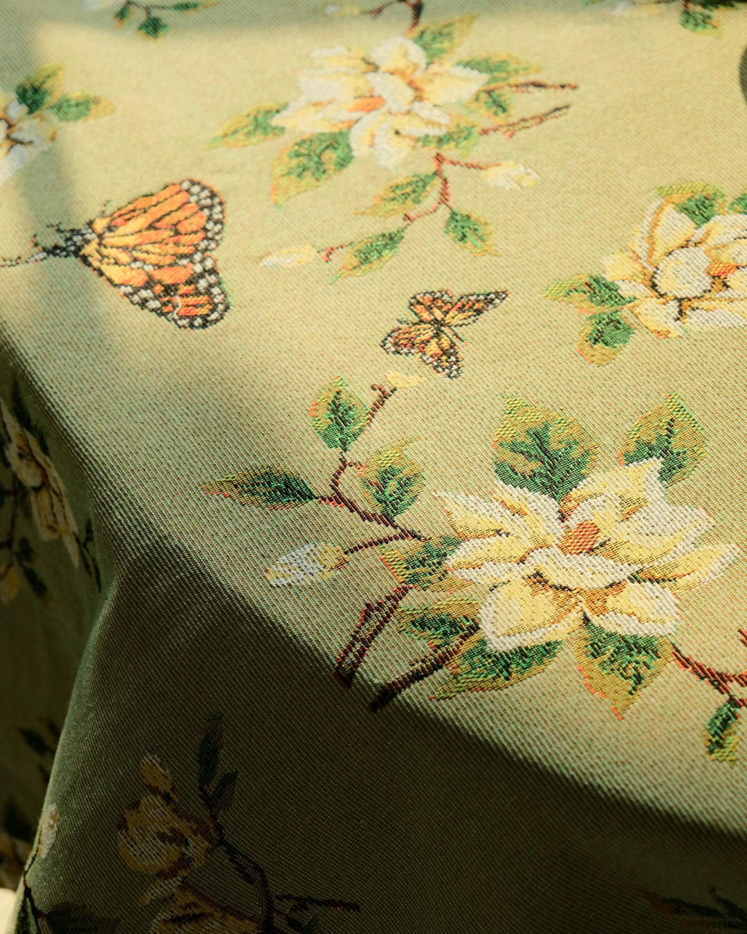 Botanical farmhouse tablecloth with soft green floral design