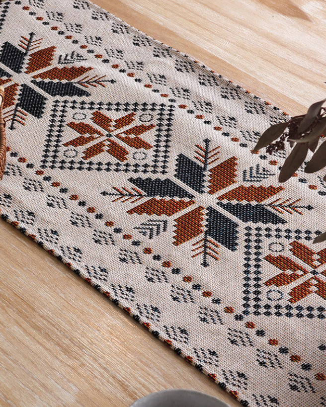 Close-up of woven snowflake pattern on a table runner