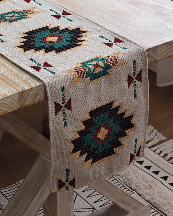 Boho geometric table runner styled with bread and fruit
