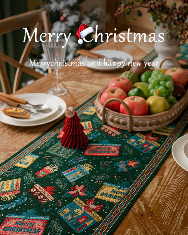 Decorated Christmas table with a green table runner, fruit basket, and 'Merry Christmas' text overlay.